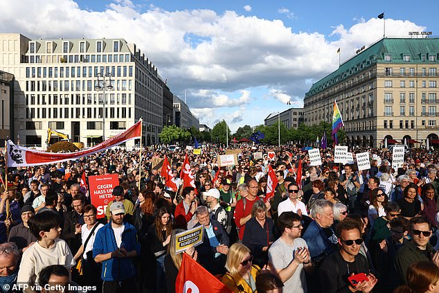 Participants gather for a demonstration against the far right and to condemn attacks on politicians, at Pariser Platz square in front of the Brandenburg Gate in Berlin, Germany, on May 5, 2024.