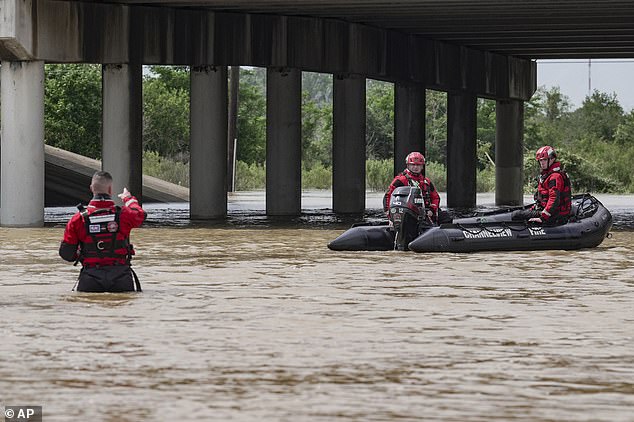 The Channelview Fire Department and deputies prepare to help evacuate the area due to severe flooding, Saturday, May 4, 2024, in Channelview, Texas.