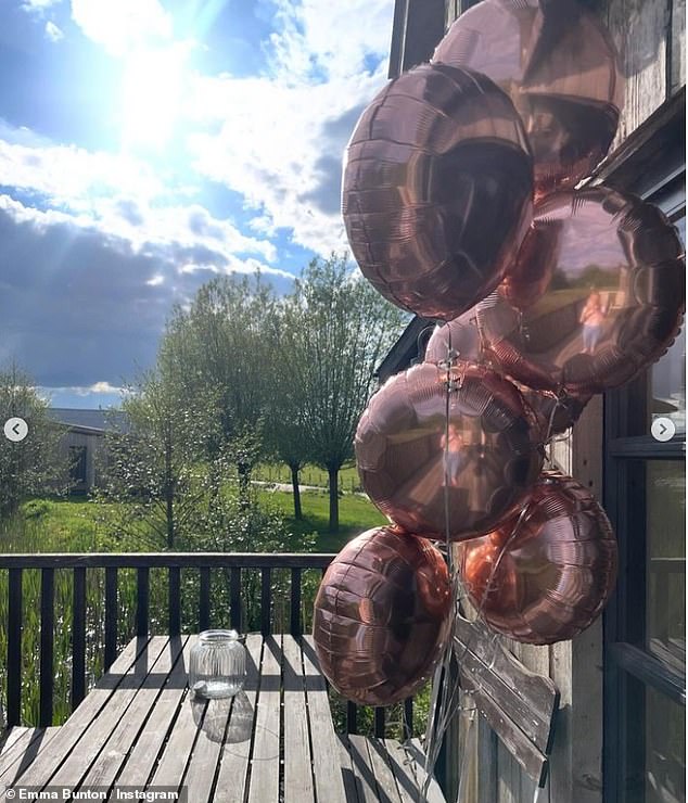 There were also pink balloons scattered in the garden for Tate's special day.