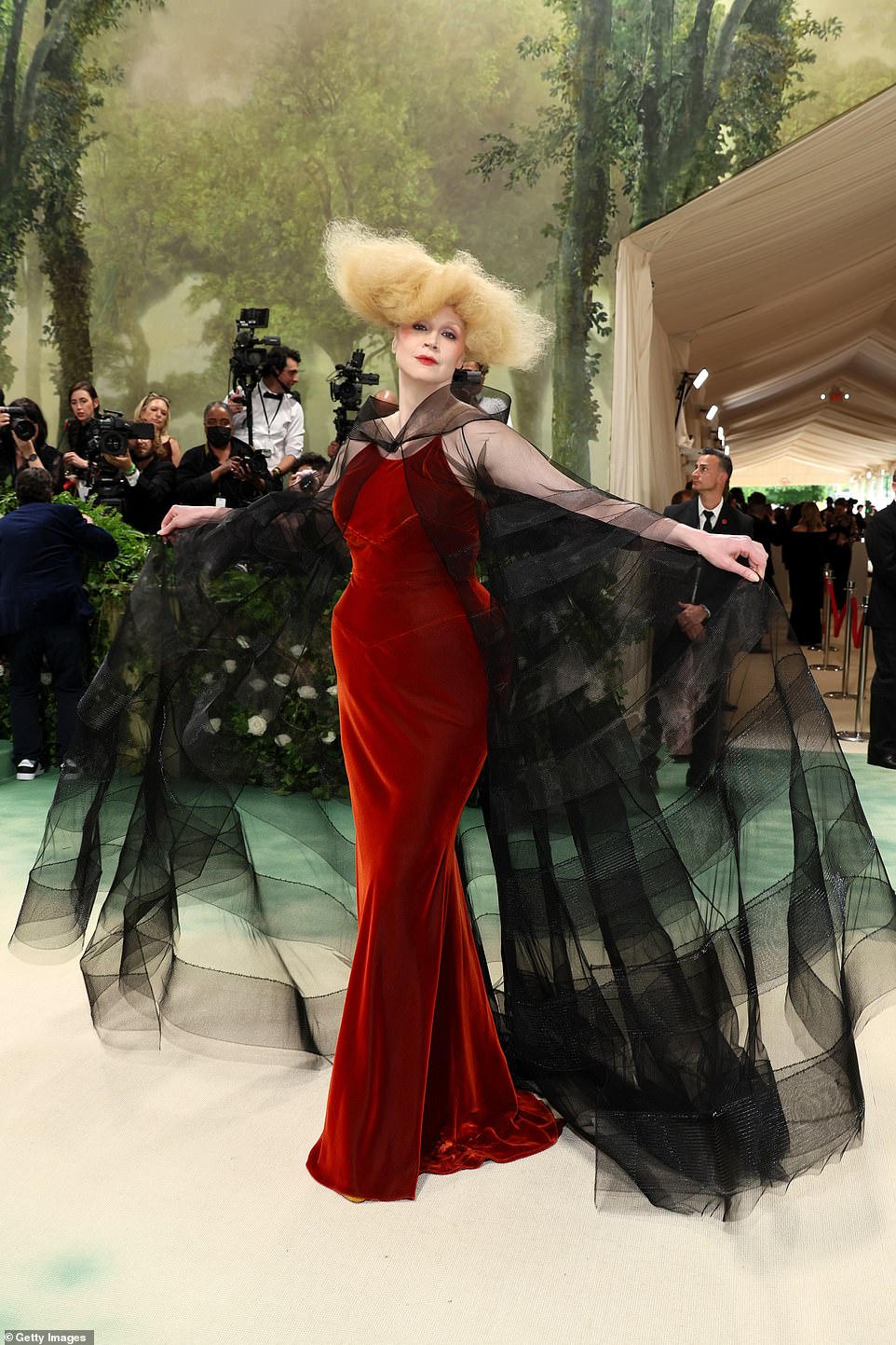 Also in attendance was Gwendoline Christie, who opted for a dramatic look for this year's gala as she donned a deep red dress with sheer, flowing black sleeves.