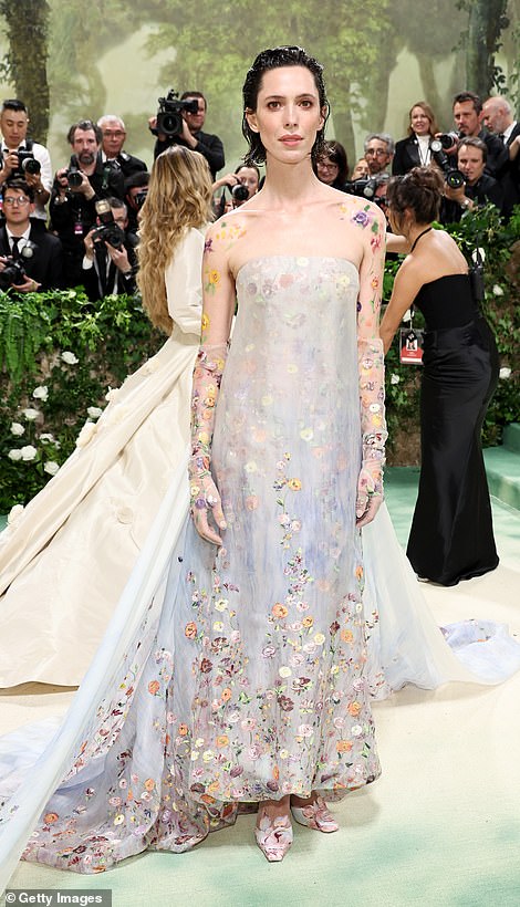 Rebecca Hall cut a glamorous figure in a light blue strapless dress with an intricate multi-coloured floral print.