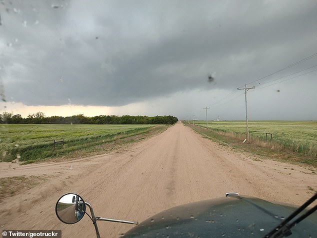 Dark clouds settled over Texas, where the National Weather Service expects large hail and isolated gusts at speeds up to 75 mph.