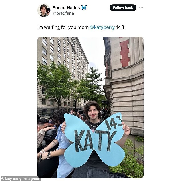 Perry also shared a tweet from a fan named @bredfaria, who was in New York City awaiting her arrival, featuring a blue butterfly cutout featuring Katy 143 dressed in black.