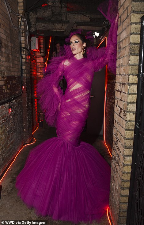 Coco Rocha turned heads in a magenta pink chiffon dress that had a mermaid tail hem.