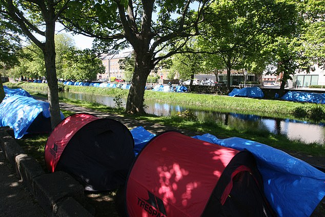 Tents for asylum seekers seen on the bank of the Grand Canal at Warrington Place in Dublin