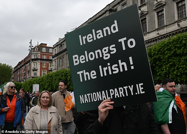 A large crowd gathers for a protest against mass immigration, marching from Dublin's Gardens of Remembrance through the city centre, on May 6, 2024.