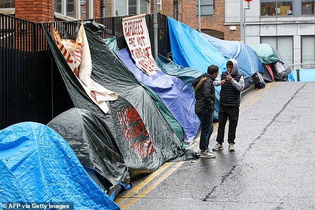 A tent village in Dublin on April 30, 2024, with migrants abandoned to sleep on footpaths and roads.