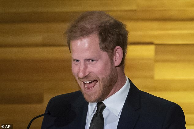 Prince Harry smiles after making a joke during the Invictus Games dinner in February