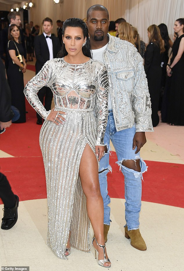 Kim and Kanye's penultimate Met Gala in 2016 saw them match in metallic silver, with Kanye wearing a particularly eye-catching bedazzled jacket.