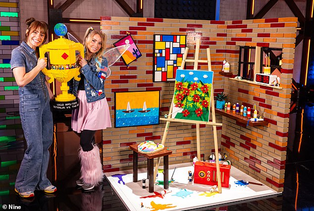 The duo walked away with a trophy and $100,000 after their record-breaking victory in which they built a massive artist studio made entirely of LEGO bricks.