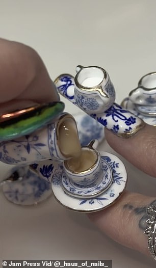 In the video, Morgan can be seen carefully pouring Brits' favorite drink into a miniature glass attached to his index finger.