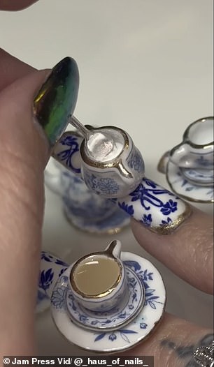 In the video, Morgan can be seen carefully pouring Brits' favorite drink into a miniature glass attached to his index finger.