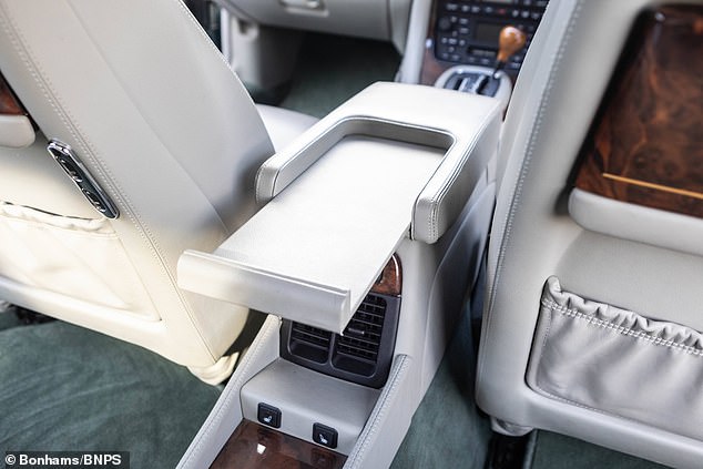 One of the vehicle's personal touches is a special retractable tray between the two front seats designed to hold Queen Elizabeth's signature handbag.