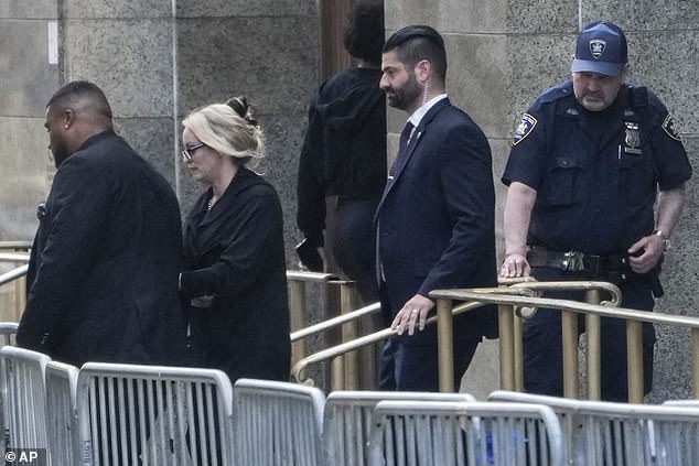 Daniels left Manhattan Criminal Court on Tuesday night.  she will return on thursday