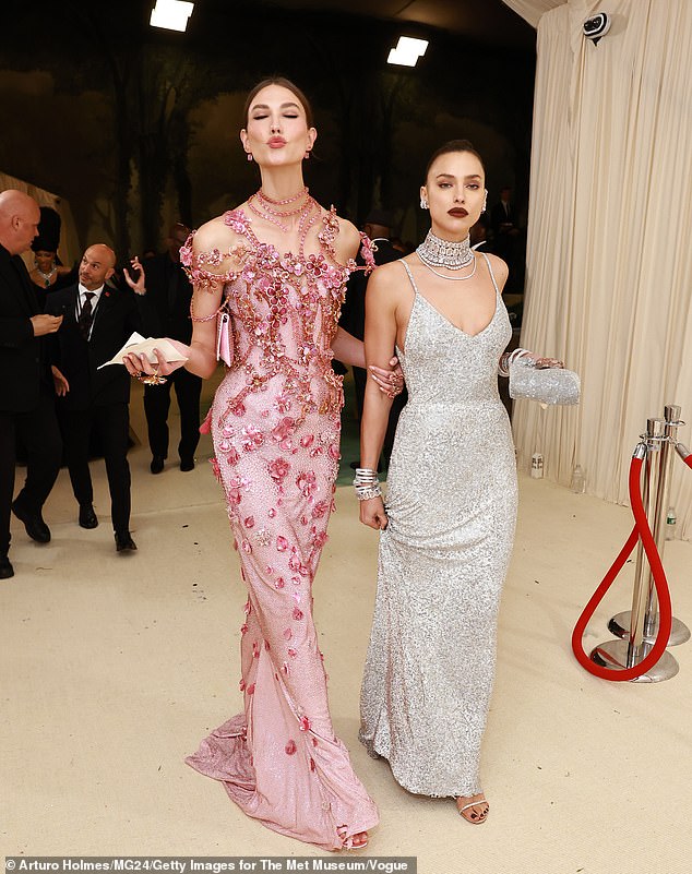 The Ralph Lauren FW/24 catwalk visited the exhibition 'Sleeping Beauties: The Awakening of Fashion' arm in arm with his impressive model partner, Karlie Kloss (left)