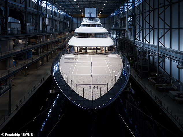 Hydrogen gas (H2) reacts with oxygen gas (O2) in the fuel cell, producing nothing but pure electricity and pure water: H2O. Above, the new superyacht leaving the company's dry dock. Above, a 'foredeck' or front view of the new superyacht