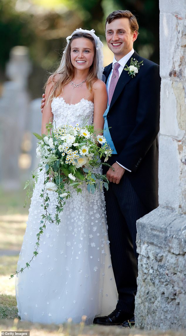 Daisy Jenks and Charlie van Straubenzee leave St Mary the Virgin Church after their wedding, attended by the Duke and Duchess of Sussex in 2018