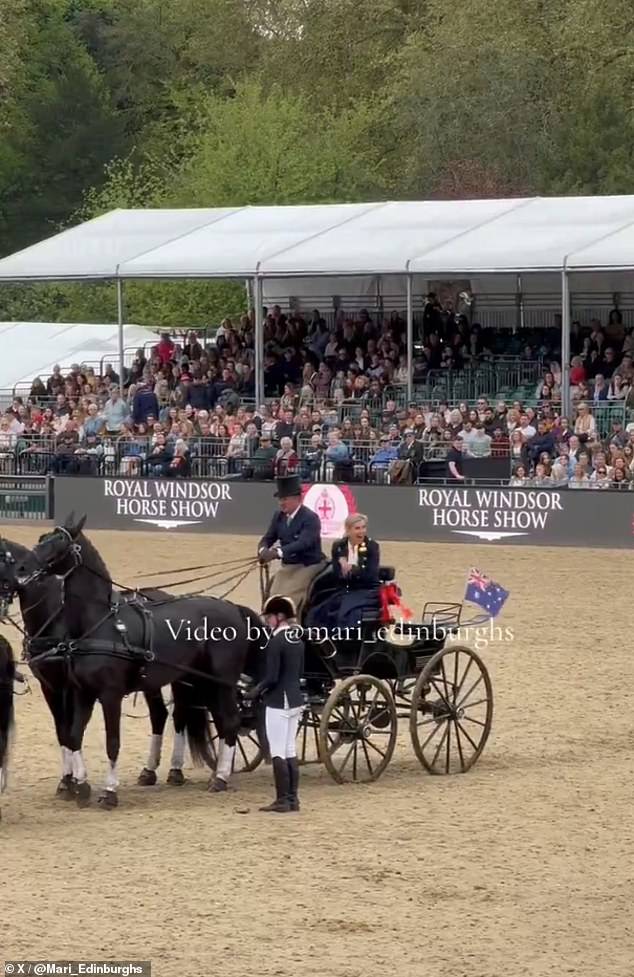 Sophie danced a little before boarding the carriage, led by four prize horses.