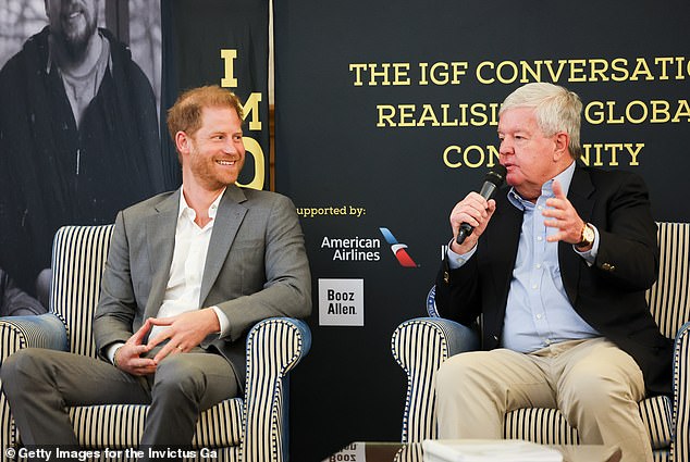 Harry speaks on stage with Sir Keith Mills to mark ten years since the inaugural Invictus Games in London 2014.