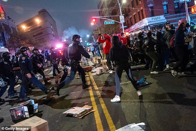 Pro-Palestinian supporters clash with police during demonstrations at the City College of New York (CUNY)