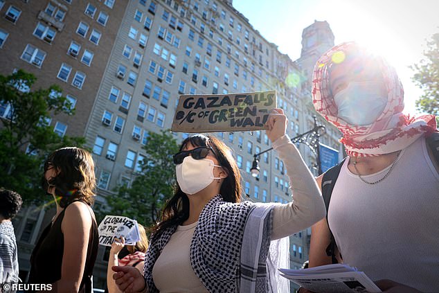 Columbia University students protest outside the homes of university administrators