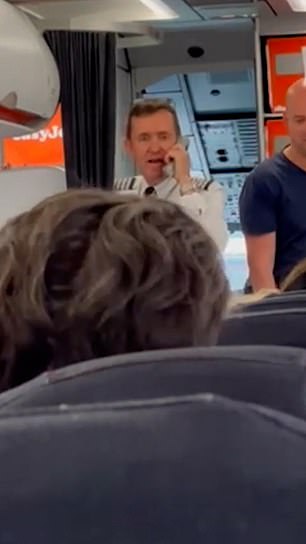 Passengers on a flight from Lisbon to Manchester were stunned when the pilot (pictured on Sunday) admitted he delayed the flight because 