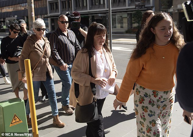 The victims' families sobbed in court Wednesday after it was confirmed that Brett Button would escape involuntary manslaughter charges as part of his guilty plea to lesser charges. Pictured is Rebecca Mullen's mother Leanne leaving court.