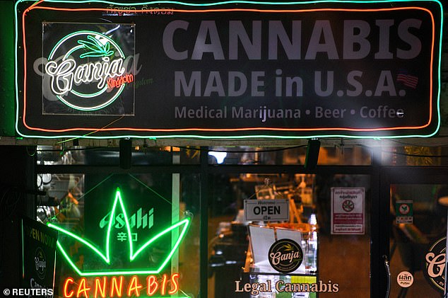 A signal "Made in USA" shown in front of a cannabis shop, on Khaosan Road, one of Bangkok's most popular tourist spots.