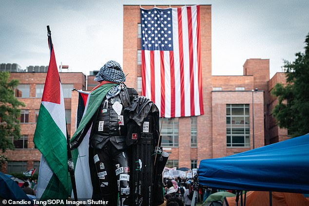 On Tuesday, Biden finally addressed the poisonous anti-Semitism now rampant on college campuses. (Above) The George Washington statue at GWU was defaced with Palestinian flags on May 7.