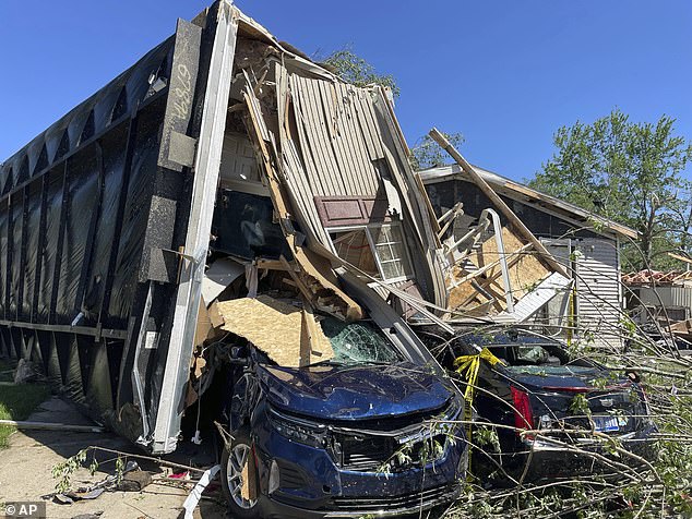 Houses were completely overturned and cars were destroyed by debris and trees carried by the storm.