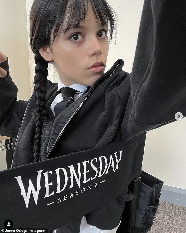 Jenna took to her own Instagram to share the news, posting a selfie from the set in her full Wednesday outfit, sitting in a director's chair with the tag: 'Wednesday season 2.'