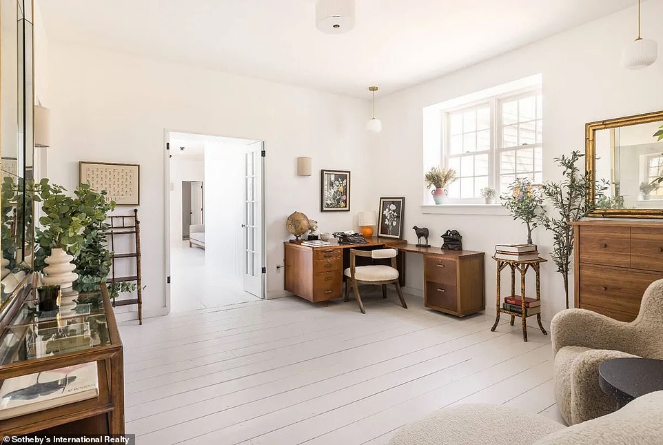 Currently, the office is sparsely decorated, but the white walls and off-white floors provide the perfect blank canvas for the new owners to arrange however they wish.