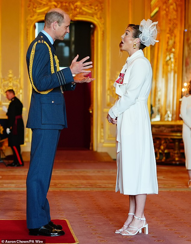 Prince William awards Mary Earps an MBE at an investiture ceremony at Windsor Castle today