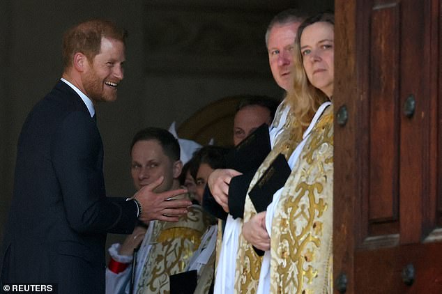 Harry is greeted as he arrives at St Paul's for the Invictus Games service this afternoon.