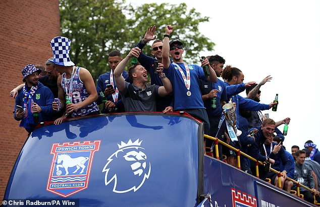 The players drank beer and were cheered by thousands of fans on Monday.