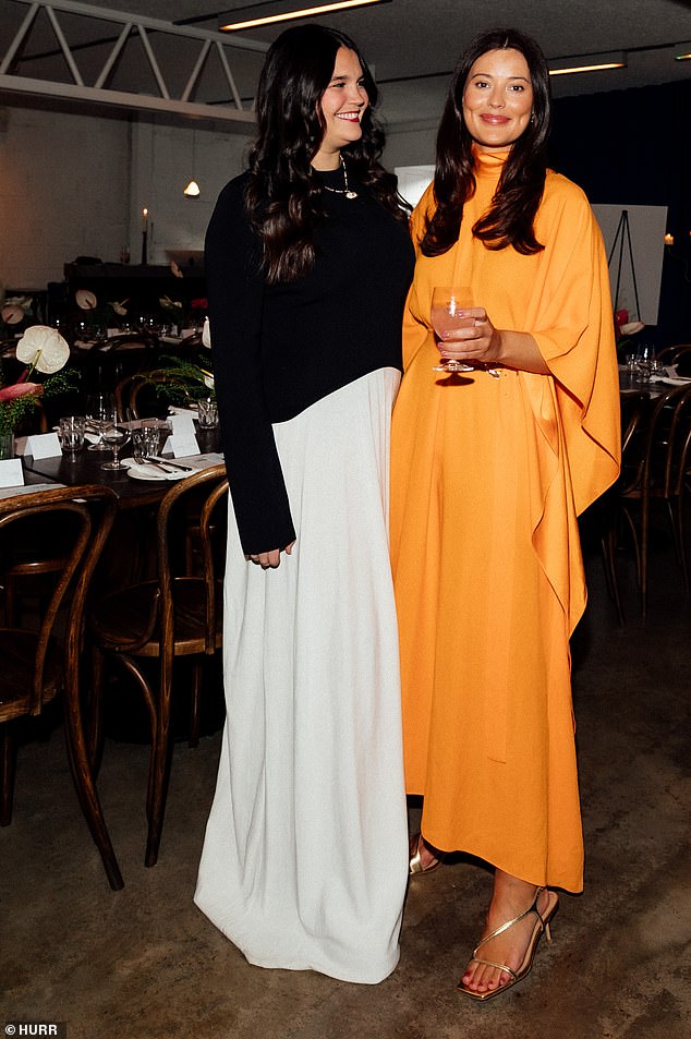 Meanwhile, HURR founder and CEO Victoria Prew (right), who was featured on Forbes 30 Under 30, stunned in a long orange dress and HURR COO Lauren Roberts (left) sported a chic look with a long white skirt.