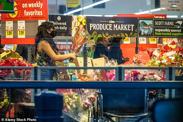 That doctor, Tom Russo, said pregnant women and others may want to wear a mask in crowded, poorly ventilated indoor environments this summer. Above, a resident of Snellville, Georgia, shops at a local supermarket while wearing a protective face mask last month, April 2024.