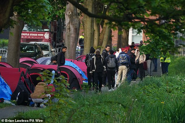 The men living in the tents were seen leaving the area ahead of the evacuation operation this morning.