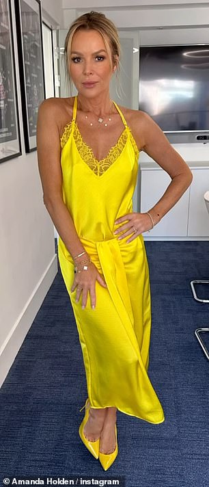 The TV star, 53, made sure all eyes were on her as she opted for a bright yellow satin two-piece suit and matching yellow heels.