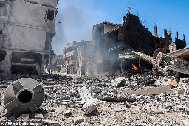 This photo taken on May 9, 2024 shows a view of destroyed and heavily damaged buildings in the Zaytoun neighborhood of Gaza City.