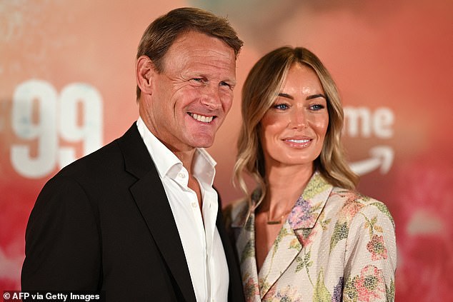 Teddy Sheringham poses for the cameras with Kristina Andrioti at the red carpet event in Manchester