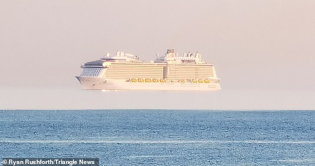 The Anthem of the Seas cruise ship, a 168,000-ton Royal Caribbean liner, appeared to float on the water.