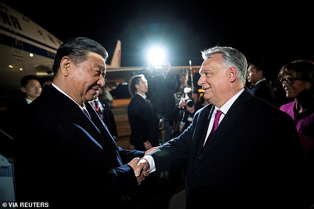 Hungarian Prime Minister Viktor Orban welcomes Chinese President Xi Jinping at Ferenc Liszt International Airport in Budapest, Hungary, on May 8, 2024.