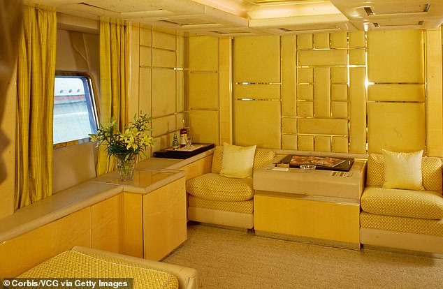 Suede leather paneled walls in a yellow living room, designed by Luigi Sturchio, aboard Donald Trump's yacht, The Trump Princess