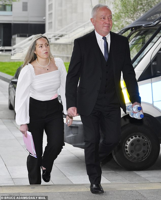 Joynes is pictured arriving at court with her father, right, yesterday.