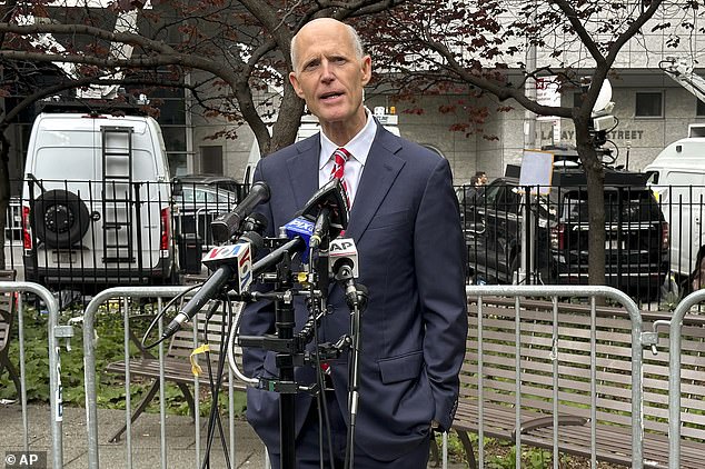 Scott emerged after an hour and a half to speak to the media outside the courthouse.