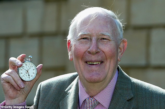 Sir Bannister, pictured here aged 75, posing with the stopwatch that measured his mile record.