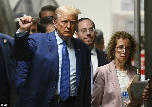 Donald Trump with his lawyer Susan Necheles returning from a break in court