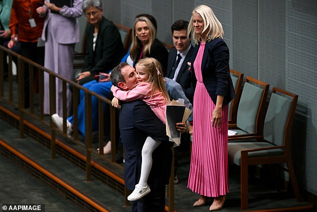 Dr Chalmers has hinted that, instead of the baby bonus, his third budget would seek to make paid parental leave more generous, highlighting the work of Finance Minister Katy Gallagher and Social Services Minister Amanda Rishworth (the Treasurer appears in the May 2023 photo hugging her daughter Annabel). after delivering his second budget while his wife Laura watches)