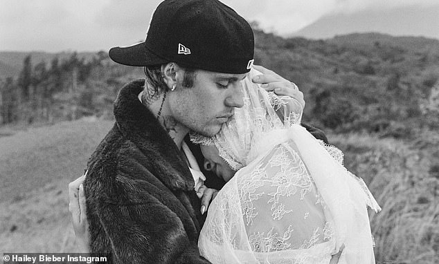 The Baby star and creator, who recently sparked concern with a crying selfie, shared a sweet kiss as they celebrated their news during their outdoor ceremony, with Hailey sporting a new diamond ring.